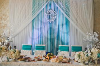 An example of a decorated hall for a wedding.