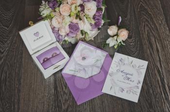 Wedding dress details and invitations.