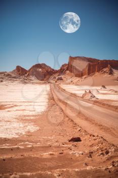 The moon in the Moon Valley in Atacama Desert, Chile