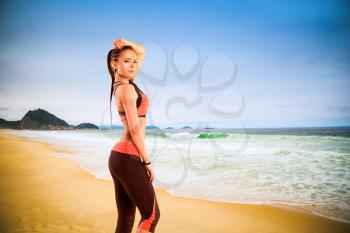 Girl athlete walks Copacabana . brazilian beach in Rio de Janeiro, Brazil, south America.