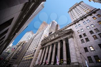 NEW YORK CITY - November 15: Wall Street with New York Stock Exchange in Manhattan Finance district , November 15, 2015 in Manhattan, New York City.