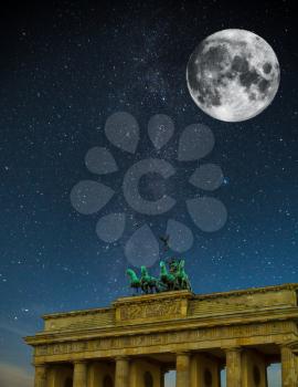 Brandenburg Gate night. Under the light of the stars the Milky Way galaxy