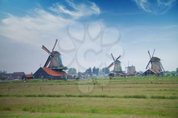 Traditional Dutch windmills with canal near the Amsterdam, Holland