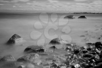 rocks in the sea. black-and-white photos on a large exposure. infrared photography