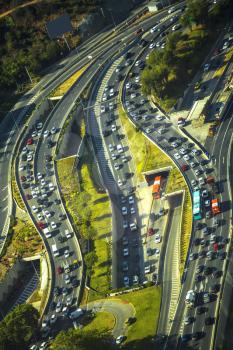 Urban transportation - rush hour traffic on a city roads.