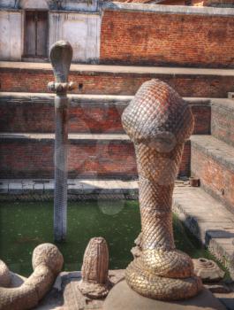 snake pit. hindu mythology in the water reservoirs in Bhaktapur Durbar square , Kathmandu, Nepal,Asia,unesco heritage
