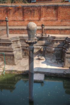 snake pit. hindu mythology in the water reservoirs in Bhaktapur Durbar square , Kathmandu, Nepal,Asia,unesco heritage