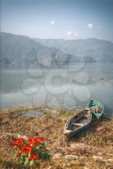 Phewa Lake - the second largest lake in Nepal located in the Pokhara Valley near the town and the mountain Sarangkot.