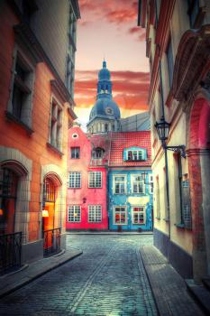 Vintage retro travel image of a narrow medieval street in old town Riga