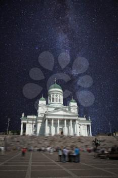Senate Square - the area in the center of Helsinki in Kruununhaka district, visiting card of the city. night shining moon and stars.