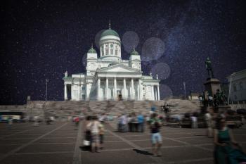 Senate Square - the area in the center of Helsinki in Kruununhaka district, visiting card of the city. night shining moon and stars.