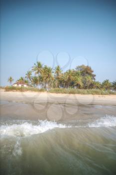 Goa is a state in the south-west of India. The boat is by the ocean