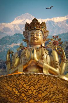 golden statue of Chenrezig stands in Kathmandu. Nepal