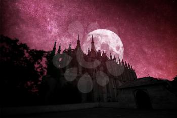 Kutna Hora in the Czech Republic. at night the stars and the moon shine.