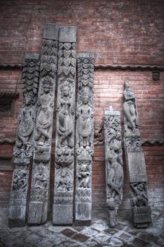 ancient statues of Nepal carved from stone and wood