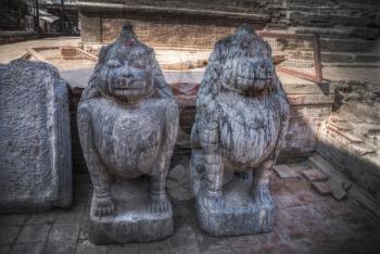 ancient statues of Nepal carved from stone and wood
