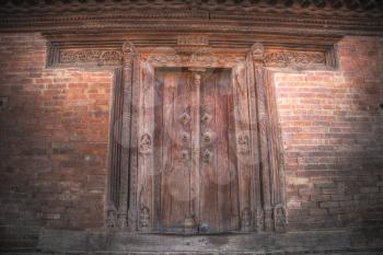ancient doors of Nepal carved from stone and wood