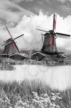 Traditional houses in Holland town Volendam, Netherlands. black and red and white photo