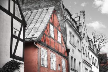 old houses on Riga street. Latvia. Europe. black and red and white photo