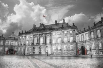 The Royal Amalienborg Palace in Copenhagen. Denmark. black and red and white photo