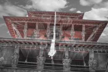 Temples of Durbar Square in Bhaktapur, Kathmandu valey, Nepal. black and red and white photo