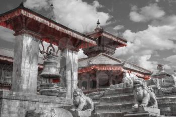 Temples of Durbar Square in Bhaktapur, Kathmandu valey, Nepal. black and red and white photo