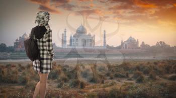 woman tourist travel around the city of Agra. Taj Mahal.