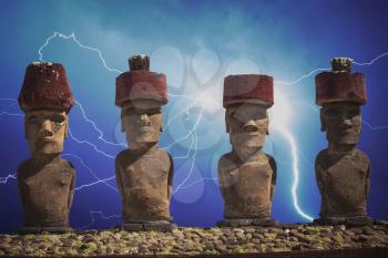 A statue on Easter Island or Rapa Nui in the southeastern Pacific, the territory of Chile. A strong thunderstorm and a lot of lightning.