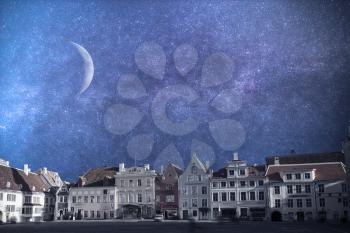 Tallinn - the capital of Estonia, the old city. Astrophotography. Night sky with stars.
