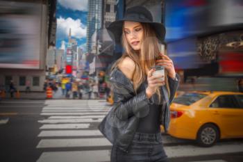 woman is walking around Manhattan in New York.