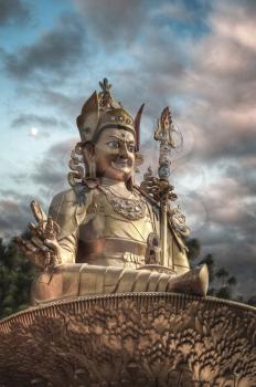 Gold Guru Rinpoche statue stands in Kathmandu. Nepal