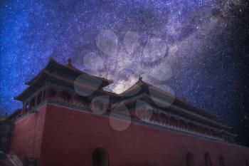 Night landscape of the Starry sky. The Forbidden City of Beijing, China