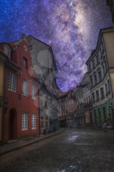 Starry night sky. old houses on Riga street. Latvia. Europe