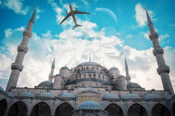the plane flies low over the  Blue Mosque Istanbul, Turkey. Sultanahmet Camii.