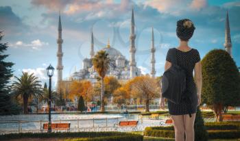 a woman travels through Istanbul. Turkey. Blue Mosque.  
