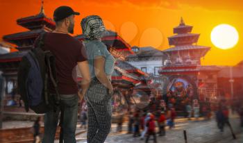A married couple of tourists travel around Kathmandu, Nepal.