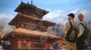 a couple of tourists travel around the city of Kathmandu. Nepal.