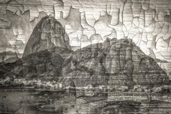 Stylized as an old cracked black and white photograph. Rio De Janeiro, Brazil in the evening sun light