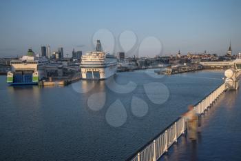 at dawn the cruise liner is preparing to leave from the port of Tallinn