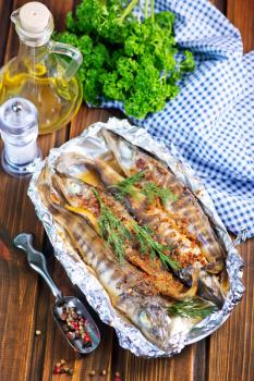 baked fish with spice in the foil