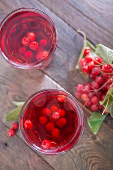 viburnum drink in the glass and on a table