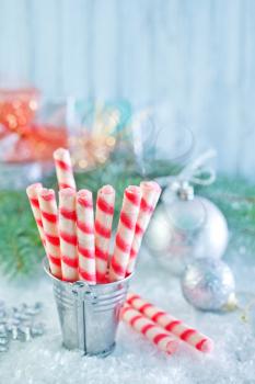 biscuit sticks and christmas decoration on a table