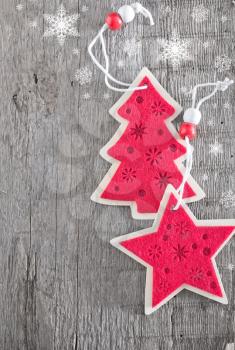 red christmas decoration on the wooden table