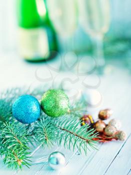 two shampagne glasses and decoration for christmas tree