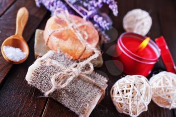 handmade soaps on the wooden table, spa objects