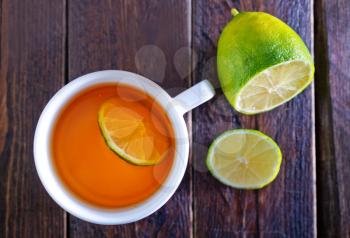 fresh tea with lemon in white cup
