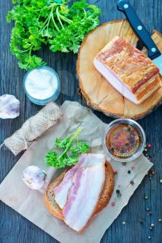 smoked lard with bread with aroma spice
