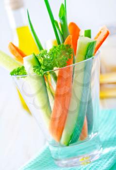 vegetables in glass and on a table
