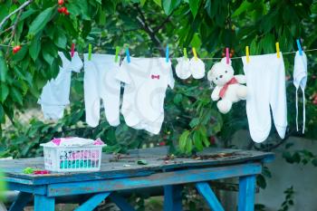 baby clothes on rope in the garden