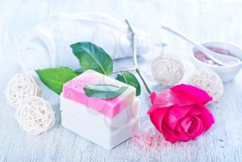 aroma soap and rose on a table
